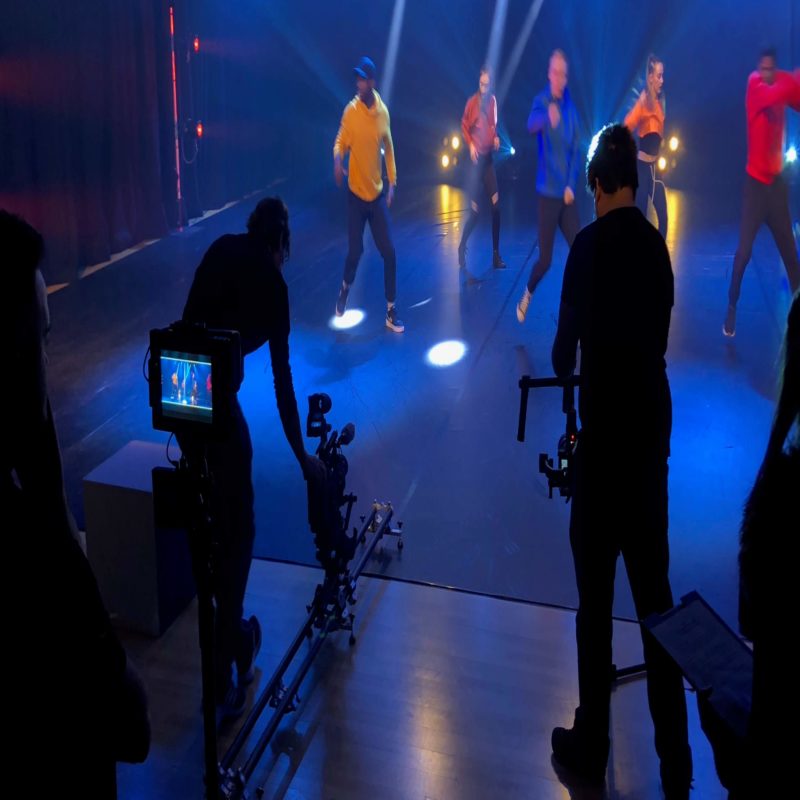 On stage filming dance rehearsals
